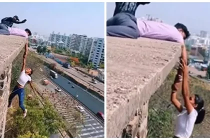 Practicing on the top of a 10-story building by holding a friend's hand. After the video went viral, the police pulled it up.